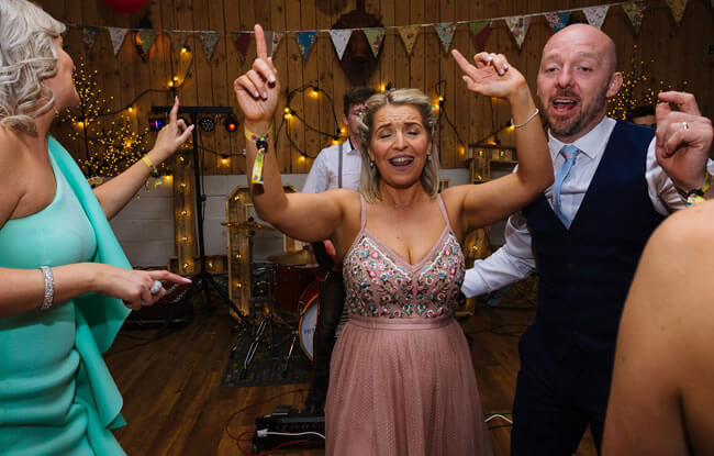 bride and groom up dancing